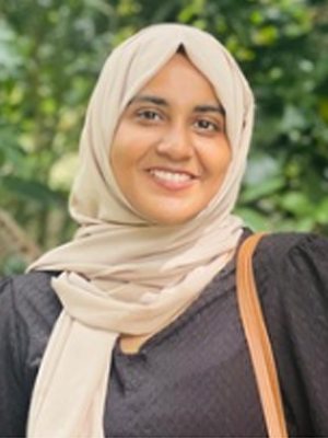 Ms. AMINA ELAMBILAT